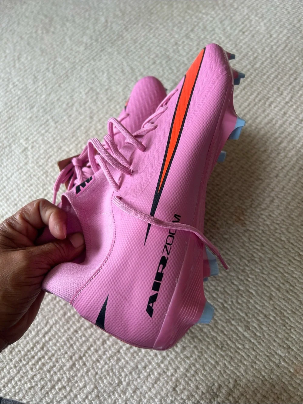 Nike Women’s Pink Sneakers with Orange Swoosh
